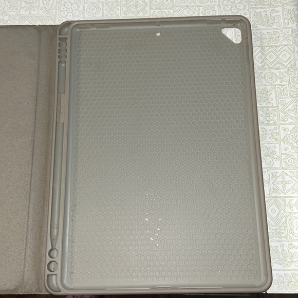 This a iPad case you can prop it up with any of the lines and the inside - Picture 5 of 5